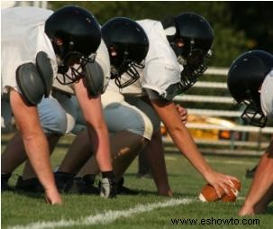 Ejercicios de acondicionamiento de verano para jugadores de fútbol americano de secundaria