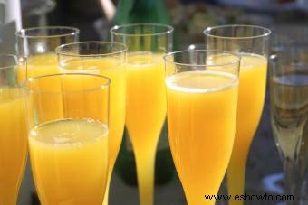 Receta de bebida de mimosa:un favorito elegante + giros simples