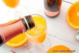 Receta de bebida de mimosa:un favorito elegante + giros simples