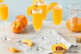 Receta de bebida de mimosa:un favorito elegante + giros simples