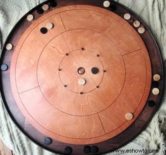 Una guía completa de Crokinole:reglas, estrategias y más