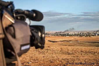 Carrera como reportero gráfico de guerra