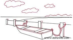 Cómo dibujar un bote de remos en un malecón en 5 pasos 