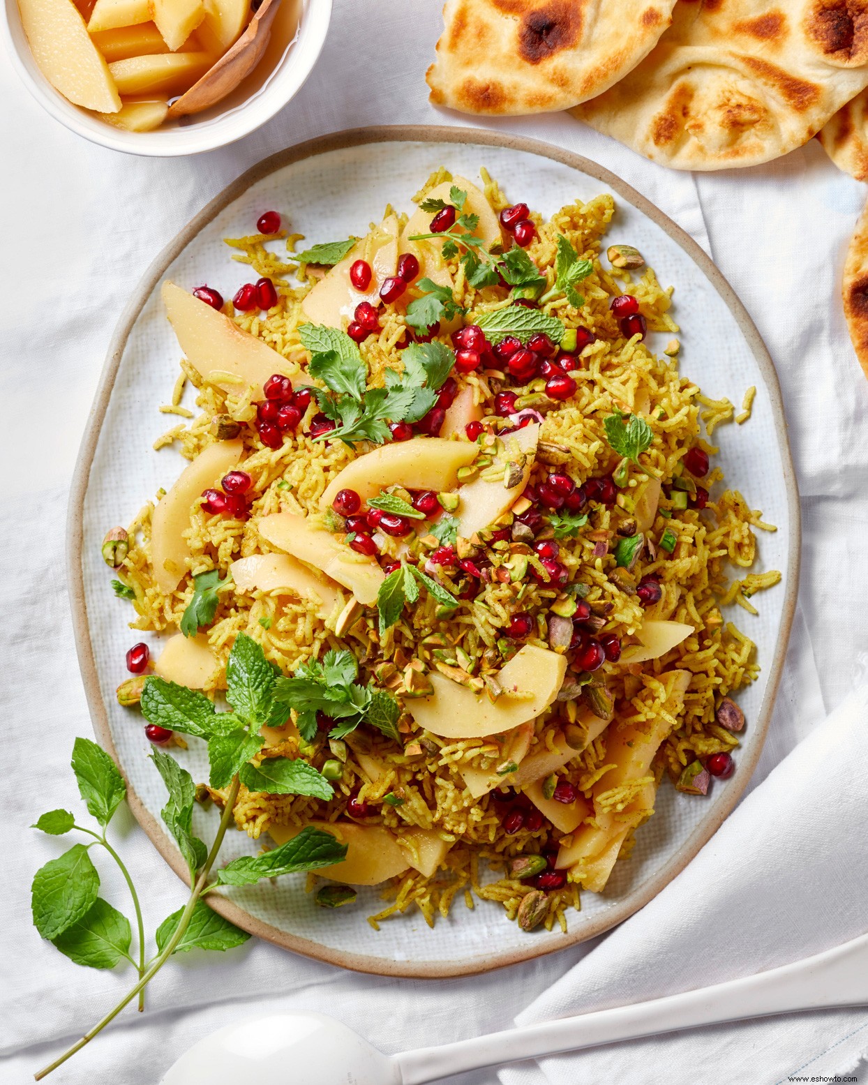 Arroz especiado con membrillo escabechado y granada 